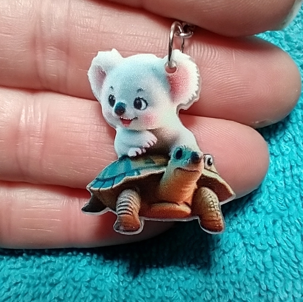 Cute koala riding on turtle wire dangle earrings white green brown